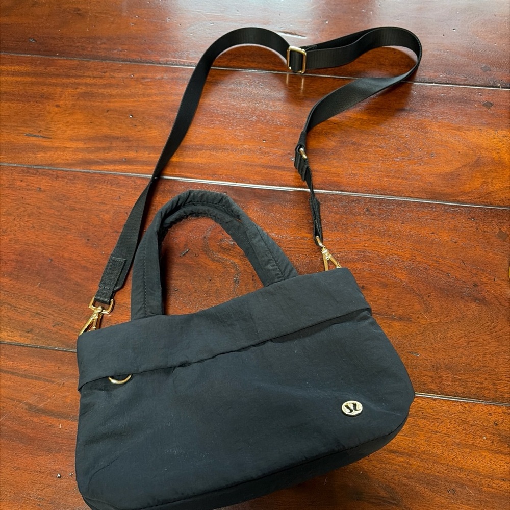 lululemon athletica Black Shoulder Bag with Gold Accents